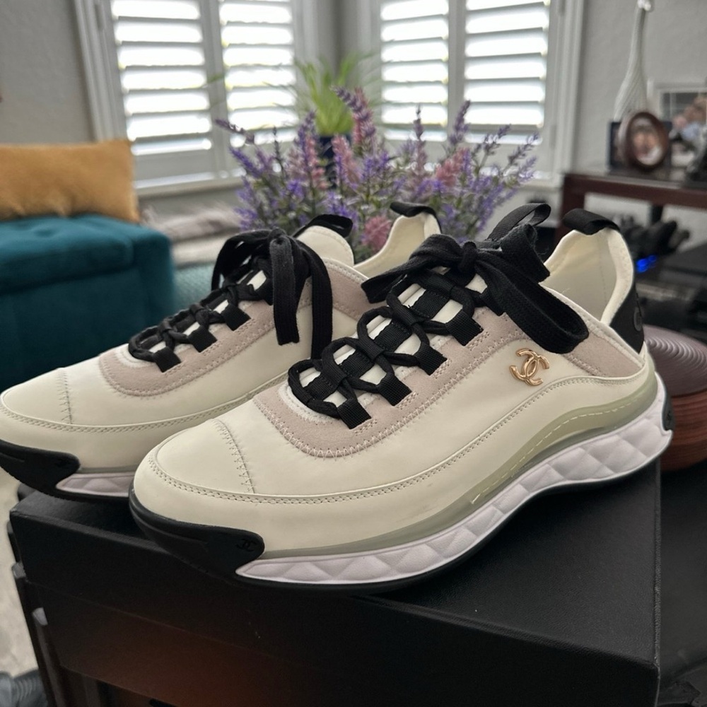 Cream and Black Athletic Shoes with Textured Upper and Thick Sole